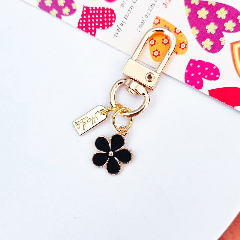 Wholesale Metal Raised Flower Keychains